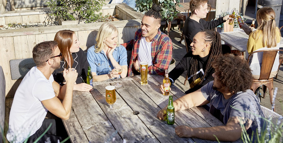 Friends enjoying Heineken together
